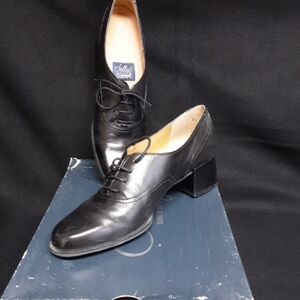 Sleek Black Leather Lace-Up Heels